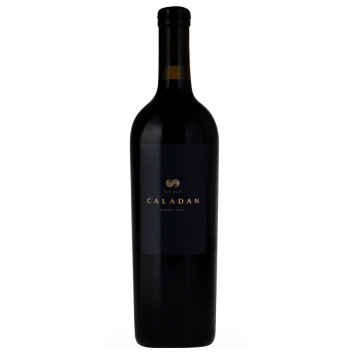 Black wine bottle with 'Caladan' label on a white background