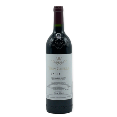 Red wine bottle with label on a white background